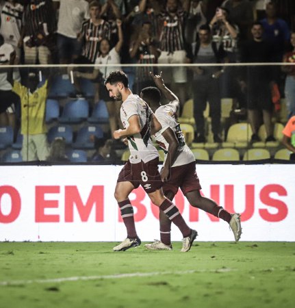 Téléchargez les photos : CARIACICA (ES), 01 / 05 / 2027-Les joueurs de Fluminense célèbrent un but, lors d'un match entre Sampaio Correa (MA) x Fluminense (RJ), valable pour la troisième phase de la Copa do Brasil, tenue dans le stade Kleber Andrade - en image libre de droit