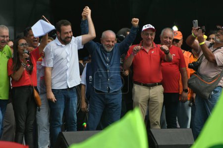 Photo for Sao Paulo (SP), 05/01/2024 - WORKER'S DAY - The President of the Republic of Brazil, Luiz Inacio Lula da Silva (PT), accompanied by federal deputy Guilherme Boulos (PSOL-SP) and union leaders, takes to the stage set up in the west parking lot - Royalty Free Image