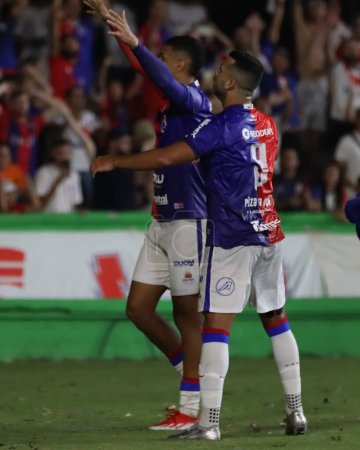 Photo for CURITIBA (PR), 11/05/2024 Magrao scored and celebrates his goal during the match between Parana against Apucarana valid for the 2nd round of the 2024 Second Division Parana Championship - Royalty Free Image