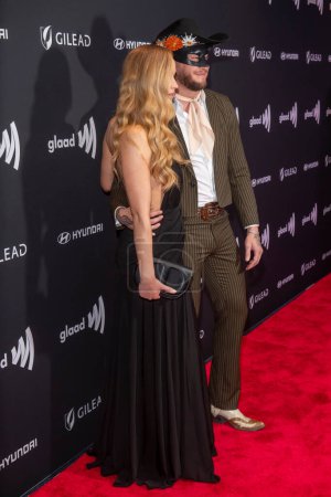 Photo for May 11, 2024, New York, New York, USA: (L-R) Jennifer Lawrence and Orville Peck attend the 35th Annual GLAAD Media Awards at New York Hilton Midtown on May 11, 2024 in New York City. - Royalty Free Image