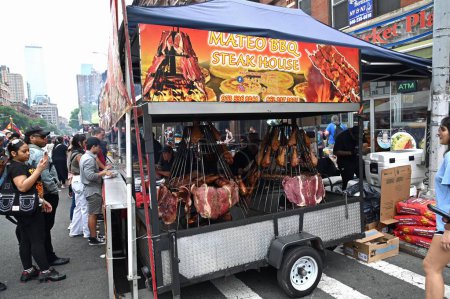 Photo for The 2024 Ninth Avenue International Food Festival. May 18th 2024, New York City, New York, U. S .A. According to the Ninth Avenue Association, their aim is to promote the individual merchants and to produce quality events, and promotions - Royalty Free Image
