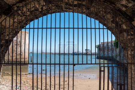 Photo for Grids at the fortified medina of El Jadida, an old Portuguese town in Morocco - Royalty Free Image