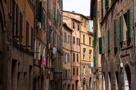 Photo for Somewhere in the streets of the old medieval Siena, Italy - Royalty Free Image
