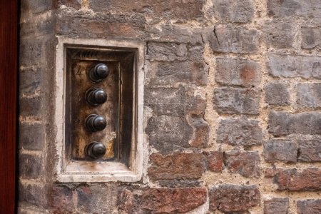 Photo for An old antique doorbell of a Sienese residential house, Italy - Royalty Free Image