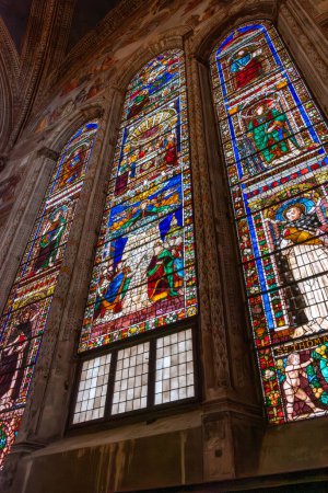 Photo for FLORENCE, ITALY - SEPTEMBER 21, 2023 - Colorful stained glass windows in the presbytery of basilica Santa Maria Novella in Florence, Italy - Royalty Free Image