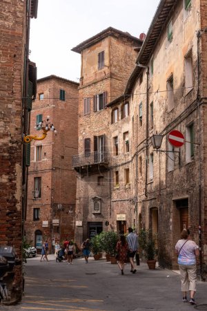 Photo for SIENA, ITALY - SEPTEMBER 23, 2023 - Somewhere in the streets of the old medieval Siena, Italy - Royalty Free Image