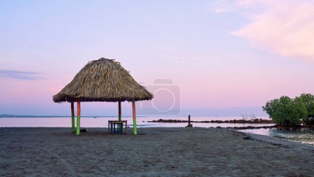 Palapas or huts built on the beaches of the Colombian Caribbean region used as shelter from the sun or rain and for eating and resting.