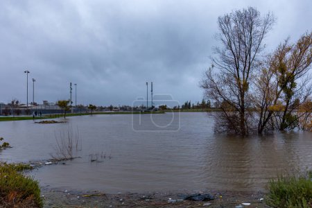 Photo for Oakley, California USA 12 31 2022: Atmospheric river filling Freedom Basin Park in Oakley, California during New Years Eve. - Royalty Free Image