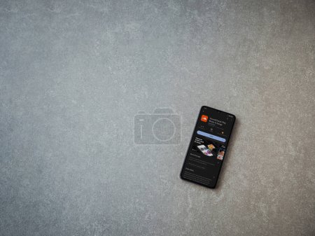 Foto de Lod, Israel - July 16,2023: SoundCloud app play store page on smartphone on ceramic stone background. Top view flat lay with copy space. - Imagen libre de derechos