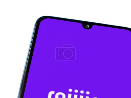 Photo for Lod, Israel - July 16,2023: Rewire app launch screen on smartphone on white background. Top view flat lay with copy space. - Royalty Free Image