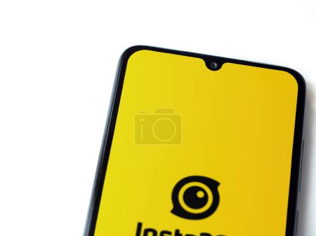Photo for Lod, Israel - July 16,2023: Insta360 app launch screen on smartphone on white background.. Top view flat lay with copy space. - Royalty Free Image