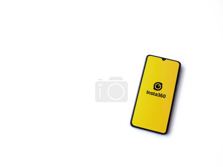 Photo for Lod, Israel - July 16,2023: Insta360 app launch screen on smartphone on white background. Top view flat lay with copy space. - Royalty Free Image