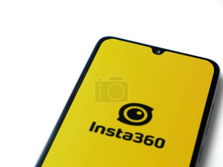 Photo for Lod, Israel - July 16,2023: Insta360 app launch screen on smartphone on white background.. Top view flat lay with copy space. - Royalty Free Image