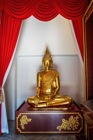 Un hito de Wat Phra Chettuphon Wimon Mangkhalaram Ratchaworamahawihan en Bangkok, Tailandia. Un lugar que todos en cada religión pueden visitar.