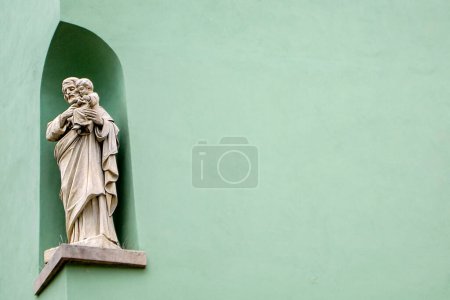 Photo for A monk with a child on a mint background. The antiques. High quality photo - Royalty Free Image