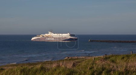 Photo for Ferry from the Norwegian shipping company Color Line, heading into the port of Hirtshals in northern Jutland, Denmark. - Royalty Free Image
