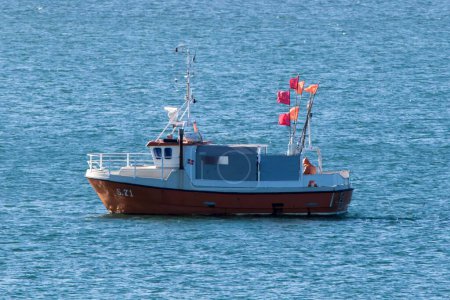 Photo for Small fishing boat on the Skagerrak off Skagen, Denmark. - Royalty Free Image