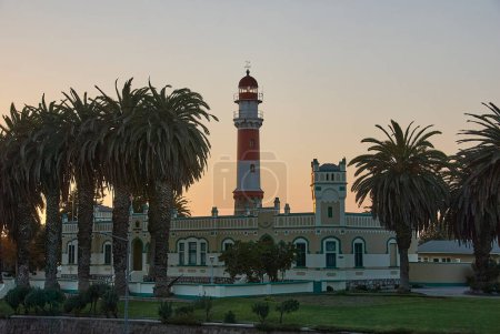 Photo for Swakopmund, Namibia - 07 18 2013 Light house in the city center at sunset - Royalty Free Image