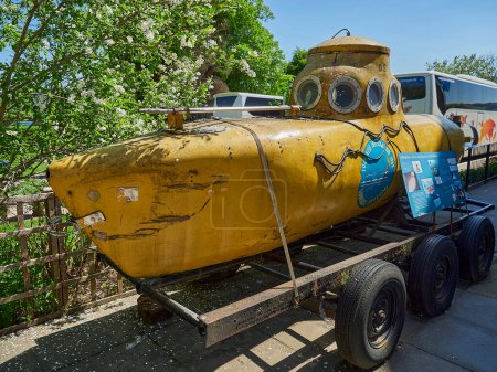 Photo for Drumnadrochit, Scotland - 05 23 2018: yellow submarine at the Loch Ness visitor centre in Scotland. - Royalty Free Image
