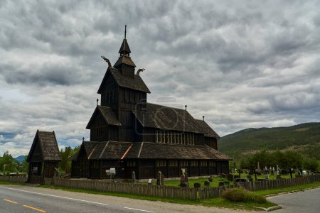 Photo for Uvdal, Norway - 06 16 2022: Uvdal Stave Church entirely built out of wood, located in Telemark in Norway. - Royalty Free Image