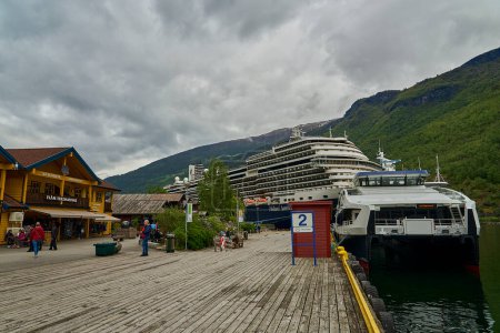 Photo for Flam, Norway - 06 03 2022: cruise ship lying in the port of Flam at the Aurlandsfjord in Norway. - Royalty Free Image