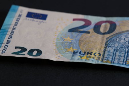 Photo for 20 euro banknote on black background close-up. Paper money banknote. Soft focus. - Royalty Free Image