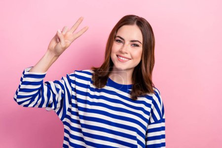 Close up photo of pretty cute positive lady wear quality stylish clothes demonstrate v-sign isolated on pink color background.