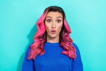 Portrait of positive cheerful astonished woman with wavy hairstyle wear knit pullover open mouth isolated on vivid teal color background.