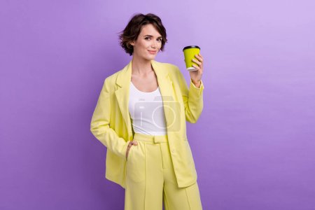 Photo of funky adorable woman dressed yellow jacket enjoying coffee isolated purple color background.