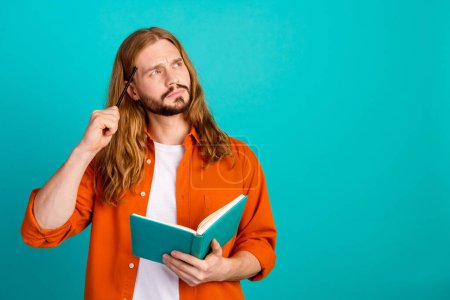 Portrait of intelligent writer with long hairstyle generate ideas for book dreamy look empty space isolated on teal color background.