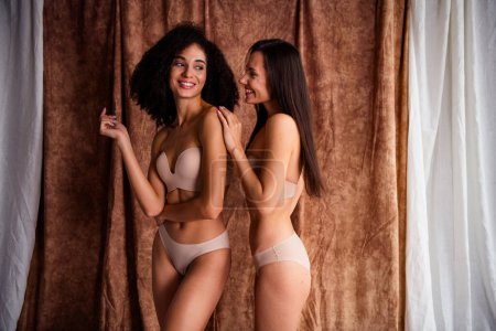 Photo of adorable dreamy women wear beige lingerie no retouch skin enjoying self acceptance isolated natural daylight fabric linen background.