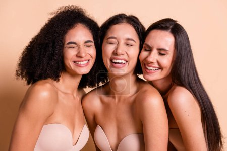 Photo of sweet funny women wear lingerie no retouch skin closed eyes laughing isolated pastel beige color background.