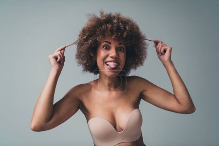 Unretouched photo of girl love herself hair show tongue out for body shaming people.