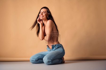Unretouched photo of smiling woman feel body positive onfidence photyographing nude isolated over pastel color background.