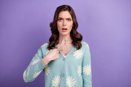Photo of impressed shocked lady dressed flower print cardigan pointing finger herself isolated violet color background.