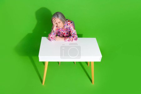 Full length top view photo of tired sad lady dressed blouse feeling tired isolated green color background.