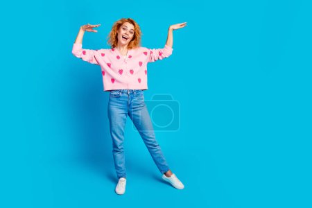 Full body photo of pretty young girl dance have fun disco wear trendy pink outfit isolated on blue color background.