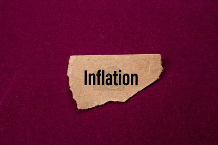 Foto de Inflation word written on torn paper. - Imagen libre de derechos