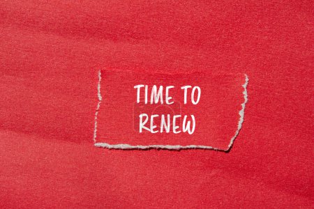 Téléchargez les photos : Time to renew words written on ripped red paper with red backgro - en image libre de droit
