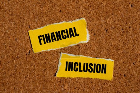 Financial inclusion words written on ripped yellow paper with br