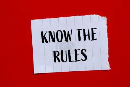 Photo for Know the rules words written on ripped paper with red background. Conceptual know the rules symbol. Copy space. - Royalty Free Image