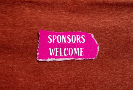Sponsors welcome words written on ripped pink paper piece with brown background. Conceptual business symbol. Copy space.