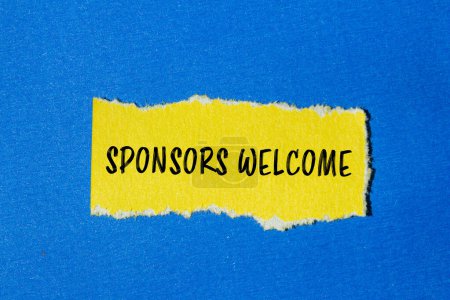 Sponsors welcome words written on ripped yellow paper piece with blue background. Conceptual business symbol. Copy space.