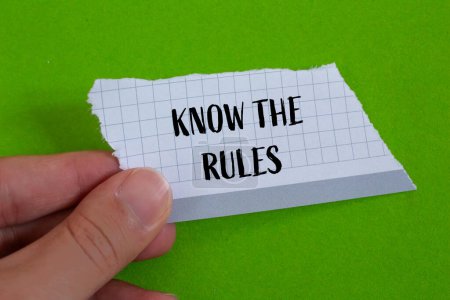 Photo for Know the rules words written on ripped paper with green background. Conceptual know the rules symbol. Copy space. - Royalty Free Image