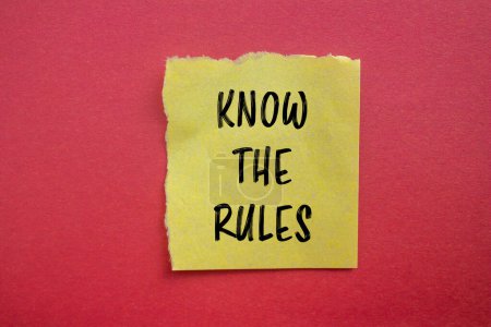 Photo for Know the rules words written on ripped yellow paper piece with red background. Conceptual know the rules symbol. Copy space. - Royalty Free Image