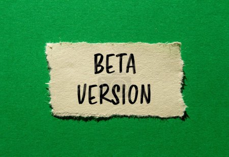 Beta version words written on ripped paper with green background. Conceptual beta version symbol. Copy space.