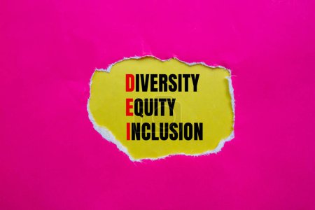 Diversity, equity and inclusion words written on ripped pink paper with yellow background. Conceptual diversity, equity and inclusion DEI symbol. Copy space.