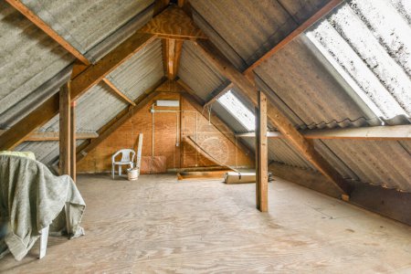 Photo for An attic that is being used as a home for the family to live in it has been taken out since - Royalty Free Image