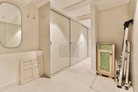 Photo for A room that is being remodeled and ready to be used as a dressing area in the closets are empty - Royalty Free Image