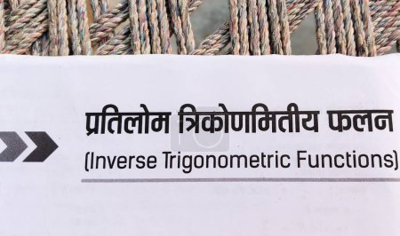 Téléchargez les photos : Nom du chapitre "Inverse trigonometric functions" of Indian mathematics livre intermédiaire écrit en hindi et en anglais - en image libre de droit